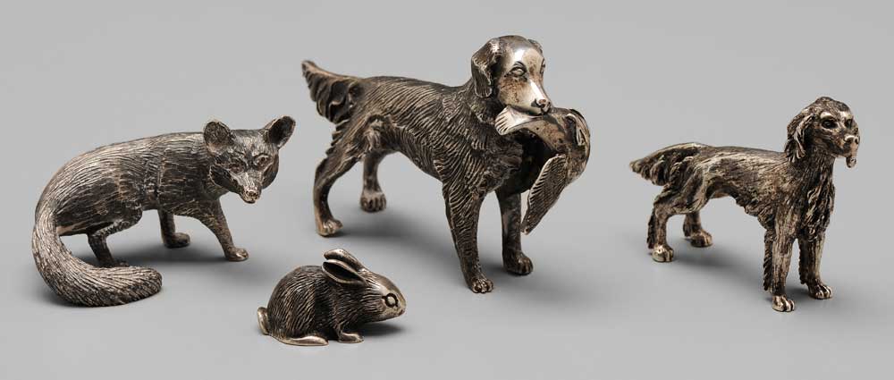 Appraisal: Four Sterling Animals one dog with marks for Cartier -