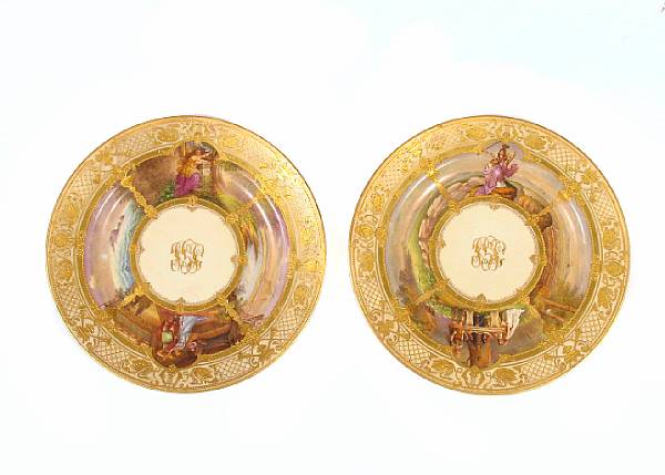 Appraisal: A pair of Dresden style paint decorated porcelain plates diameter