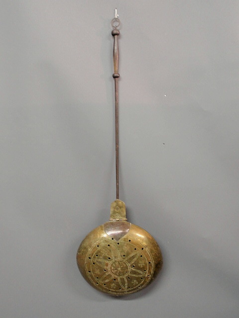 Appraisal: Brass bed warmer with a pierced pan and wrought iron