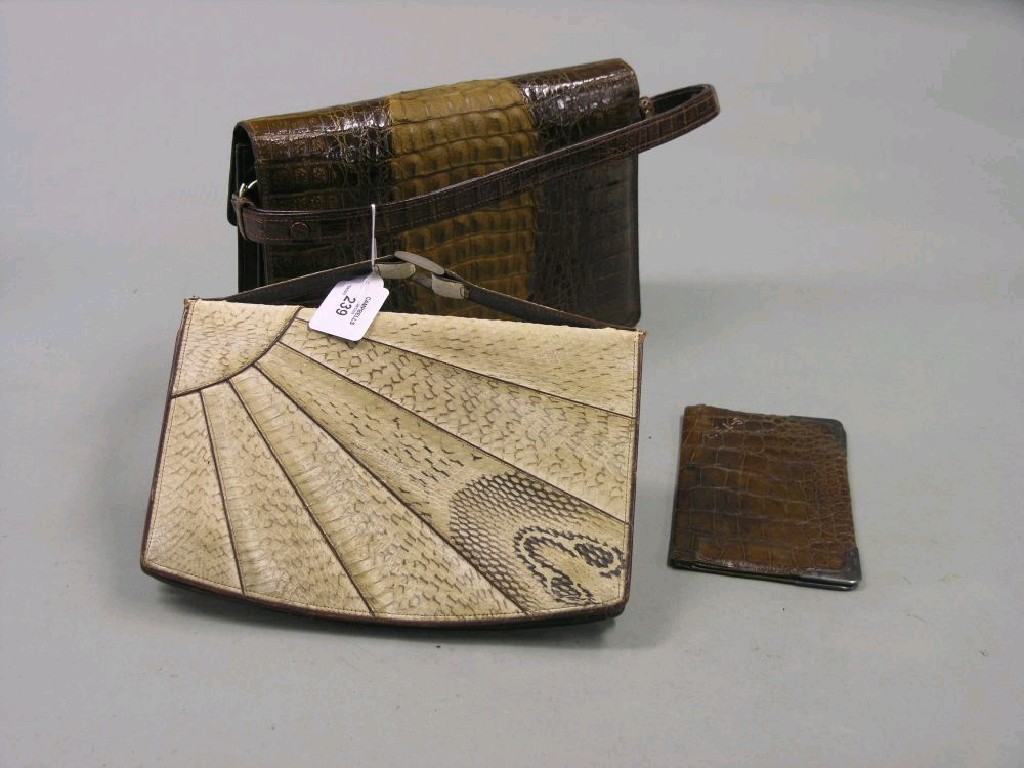 Appraisal: A crocodile skin wallet with silver mounts and two handbags