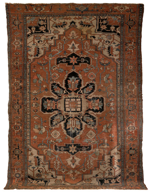 Appraisal: Serapi carpet ca with a central navy medallion on a