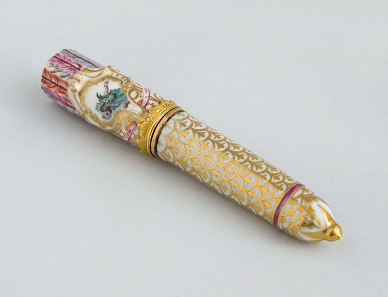 Appraisal: FRENCH GILT-METAL-MOUNTED PORCELAIN QUIVER-FORM ETUI CASE In the form of