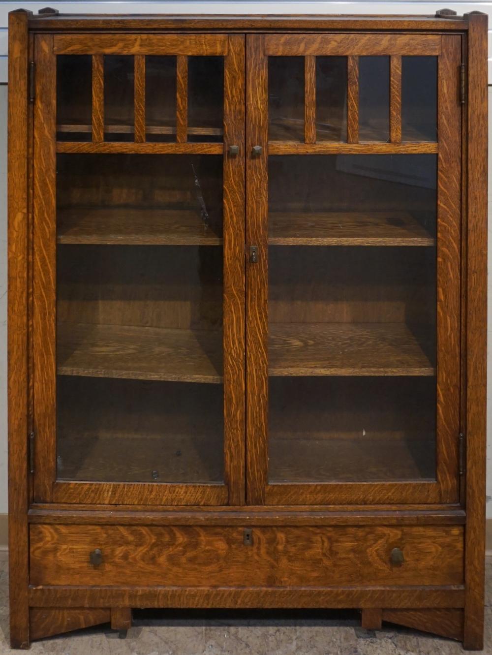 Appraisal: Arts and Crafts Style Oak Double Glazed Door Bookcase x