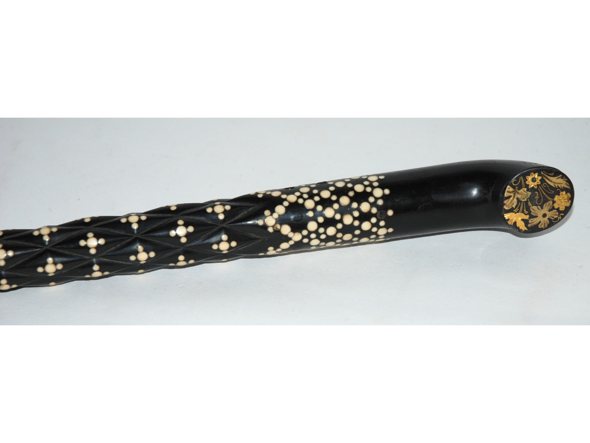 Appraisal: An ebony inlaid walking cane