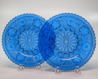 Appraisal: Lacy glass plates two Two mid th century pressed lacy