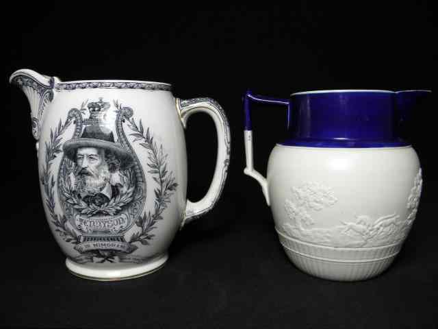 Appraisal: Two English th century porcelaneous pitchers The first is an