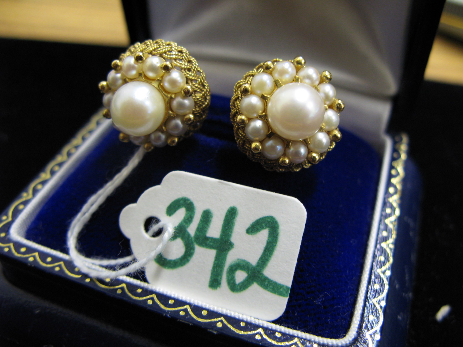 Appraisal: PAIR OF PEARL AND FOURTEEN KARAT GOLD CLIP-ON EARRINGS each