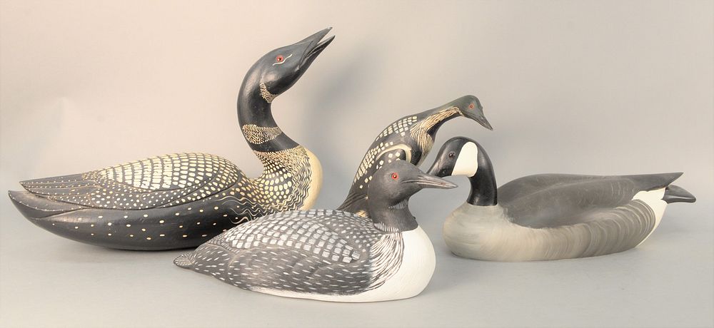 Appraisal: Four Carved Decoys two decorative Loons a Chet Reneson with