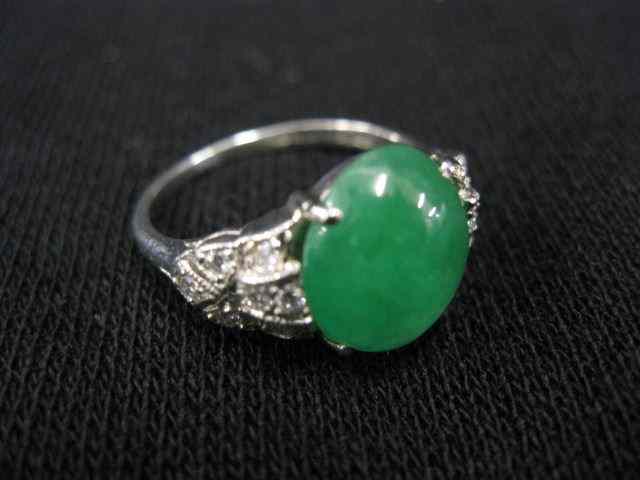 Appraisal: Platinum Jade Diamond Ring Imperialtype cabochon with diamonds on each