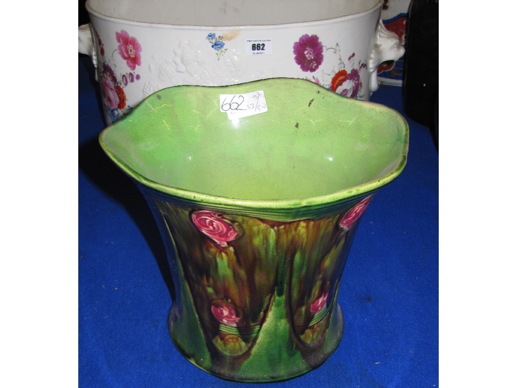 Appraisal: Creamware pottery footbath painted with flowers and a pottery jardiniere