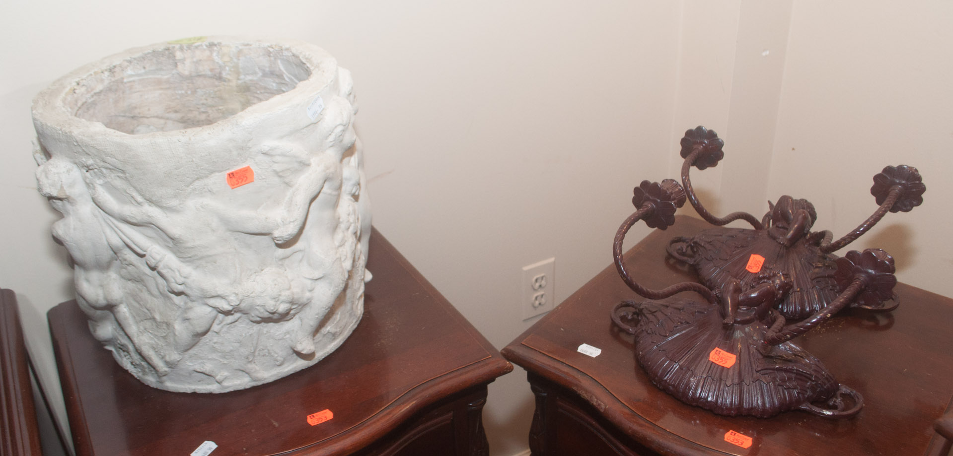 Appraisal: Two wall sconces and a terra-cotta urn Undernumber