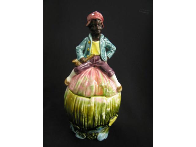 Appraisal: Black Americana Figural Majolica Tobacco Jar boy with pipe on