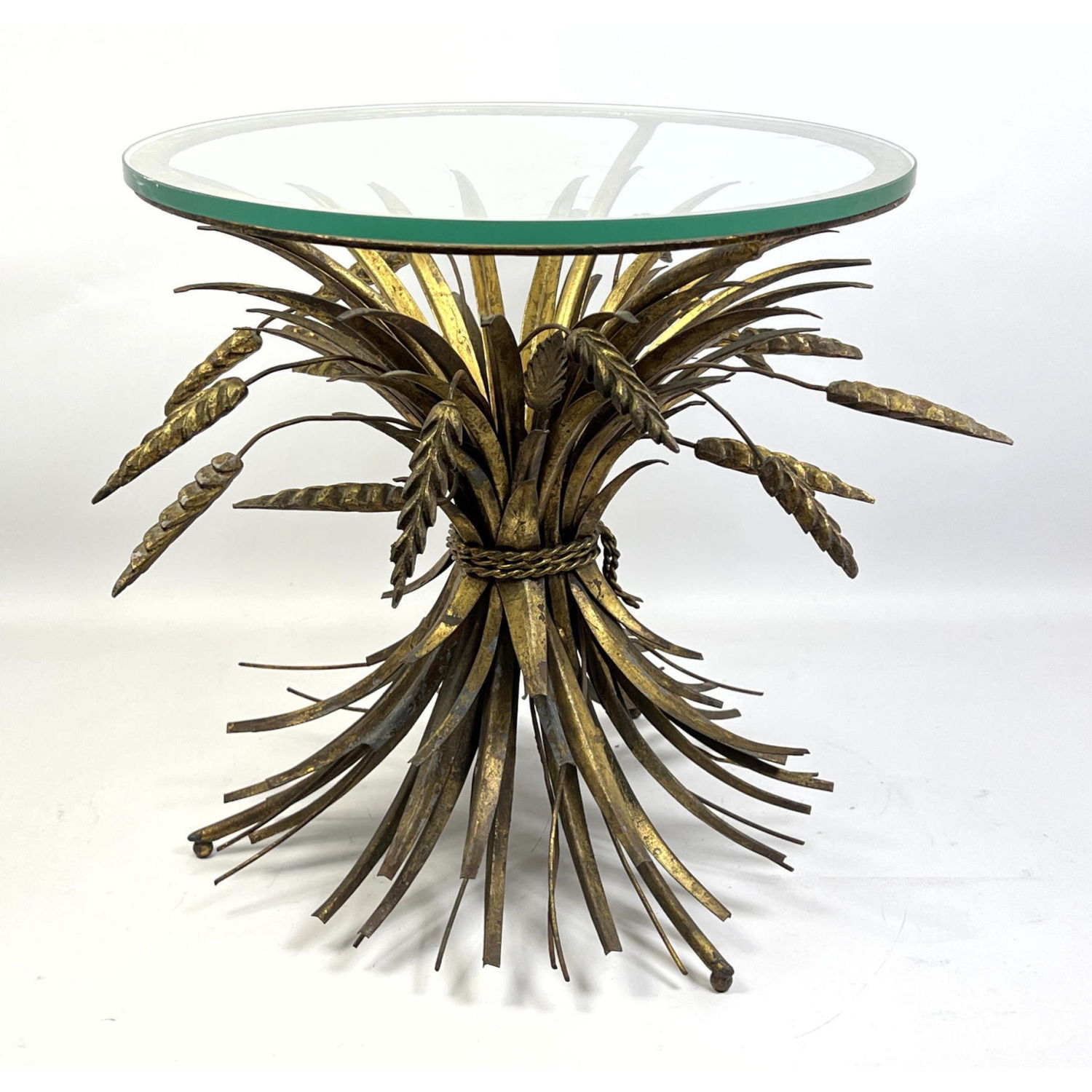 Appraisal: Gilt metal wheat sheaf table glass top end table Italian