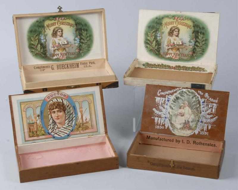 Appraisal: Lot of Christmas Related Cigar Boxes Description Includes one Merry