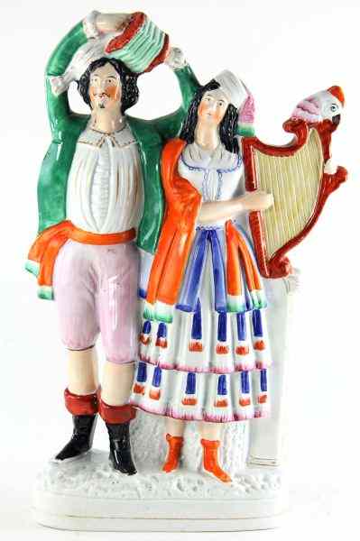 Appraisal: Staffordshire Figural th Centurygypsies with harp player and concertina in