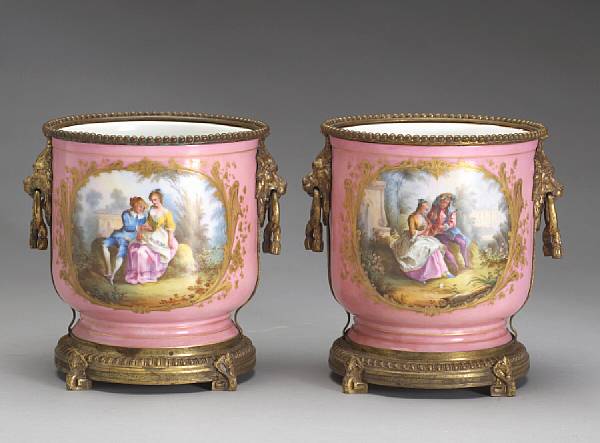 Appraisal: A pair of S vres style porcelain gilt bronze mounted