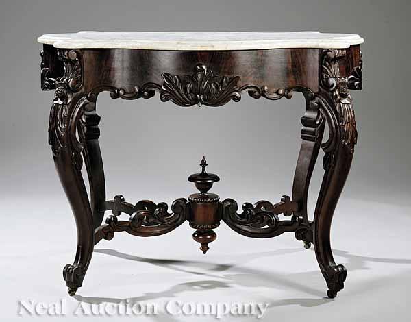 Appraisal: An American Rococo Carved Mahogany Center Table mid- th c