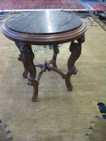 Appraisal: Italian Carved Side Table with Black Marbleinset top '' diameter