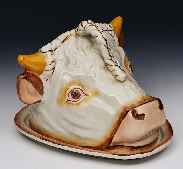 Appraisal: A VICTORIAN POTTERY CHEESE DISH in the form of a