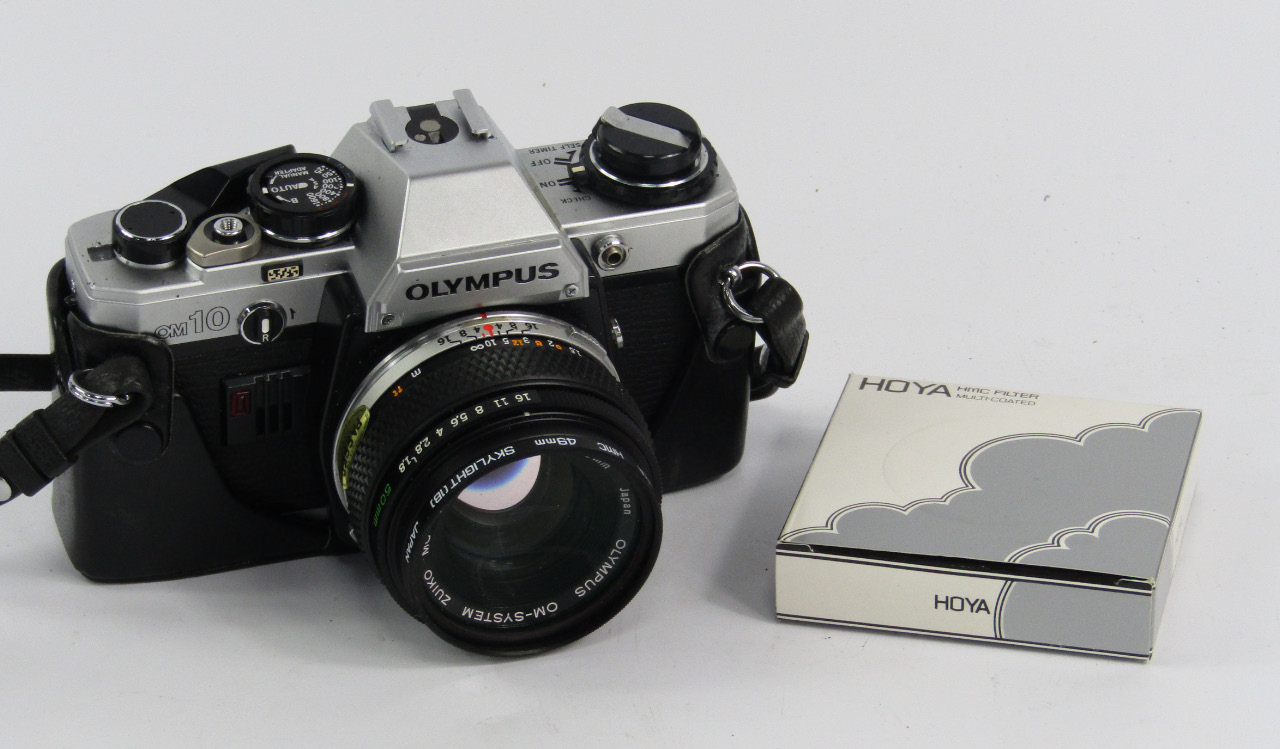 Appraisal: An Olympus OM camera with a Zuiko Mc auto s