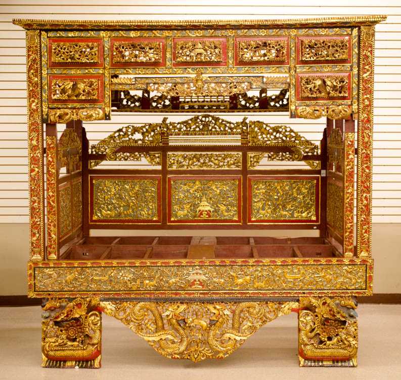 Appraisal: AN ORNATE CHINESE CARVED HARDWOOD AND PARCEL-GILT MARRIAGE BED early