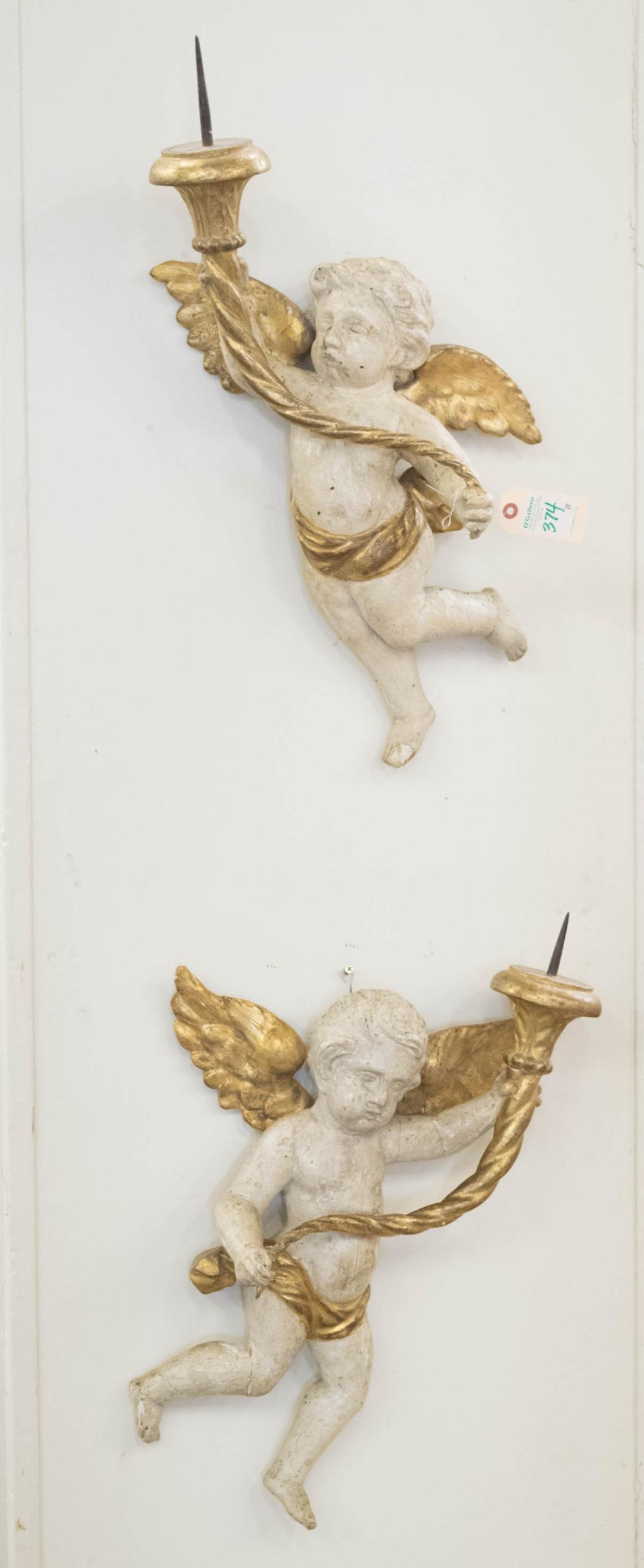 Appraisal: PAIR OF CHERUB PRICKET WALL SCONCES Italian late th early