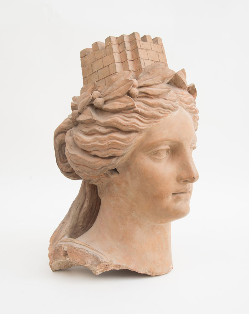 Appraisal: FRENCH TERRACOTTA HEAD OF A WOMAN REPRESENTING A CITY The