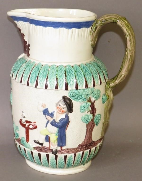 Appraisal: PEARLWARE MOLDED PRATTWARE PITCHERca relief view of parson clerk and