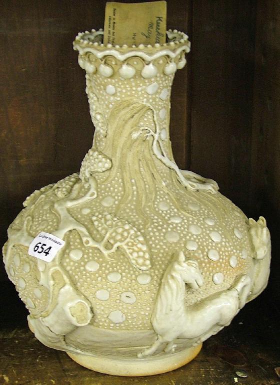 Appraisal: Chinese pottery bottle neck ovoid vase with high relief and