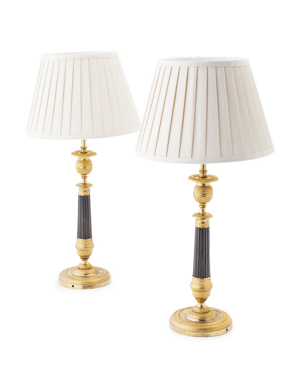 Appraisal: PAIR OF RESTAURATION PATINATED AND GILT METAL LAMPS TH CENTURY