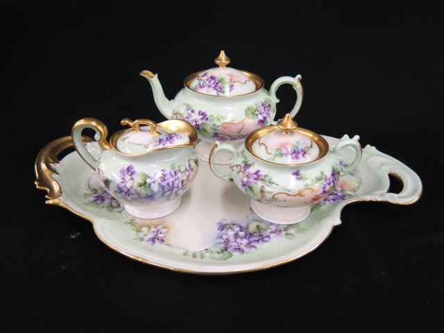 Appraisal: Handpainted Porcelain Tea Set Tray violet decor green field fancy