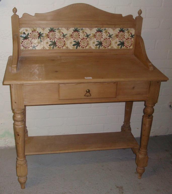 Appraisal: A Victorian stripped pine wash stand with tile back