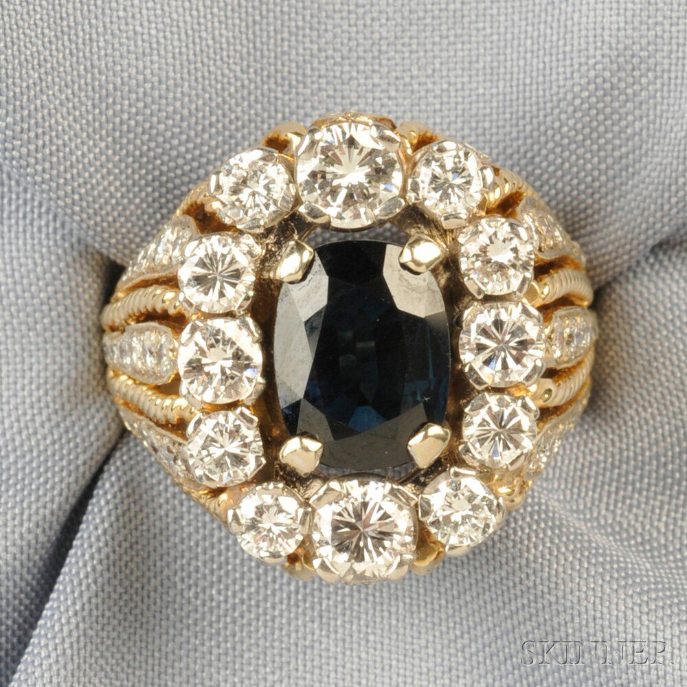 Appraisal: kt Gold Sapphire and Diamond Ring set with an oval-cut