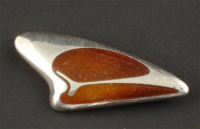 Appraisal: A Georg Jensen silver and enamel brooch designed by Henning