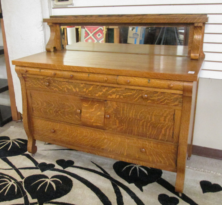 Appraisal: OAK EMPIRE REVIVAL SIDEBOARD American c having a mirror-paneled backsplash