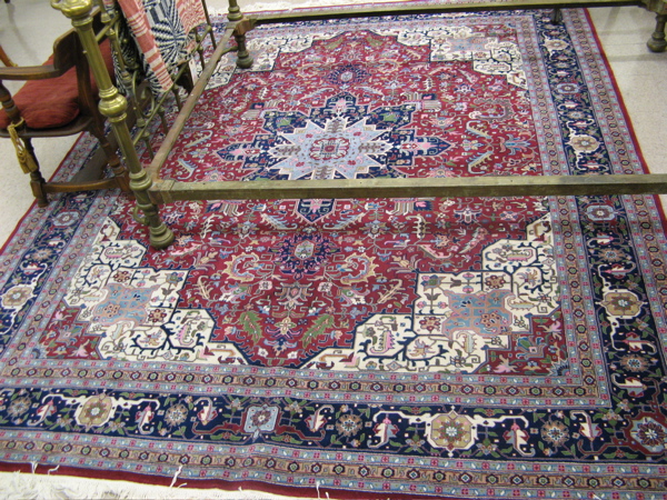 Appraisal: HAND KNOTTED ORIENTAL SILK AND WOOL CARPET central medallion and