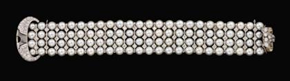 Appraisal: karat white gold pearl and diamond bracelet Ninety-six mm white