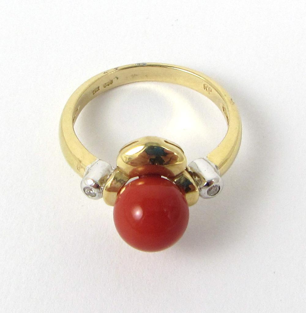 Appraisal: CORAL DIAMOND AND FOURTEEN KARAT GOLD RING The k yellow