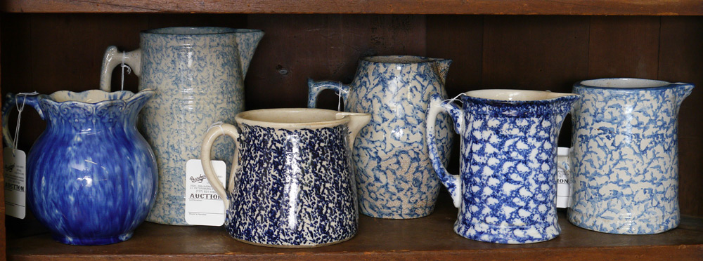 Appraisal: SPONGEWARE PITCHERS An assortment of blue decorated jugs approx ''-