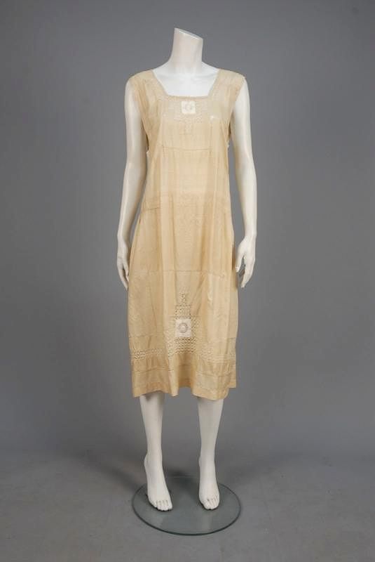 Appraisal: SILK DRESS with DRAWN THREAD DECORATION s Sleeveless ivory A-line