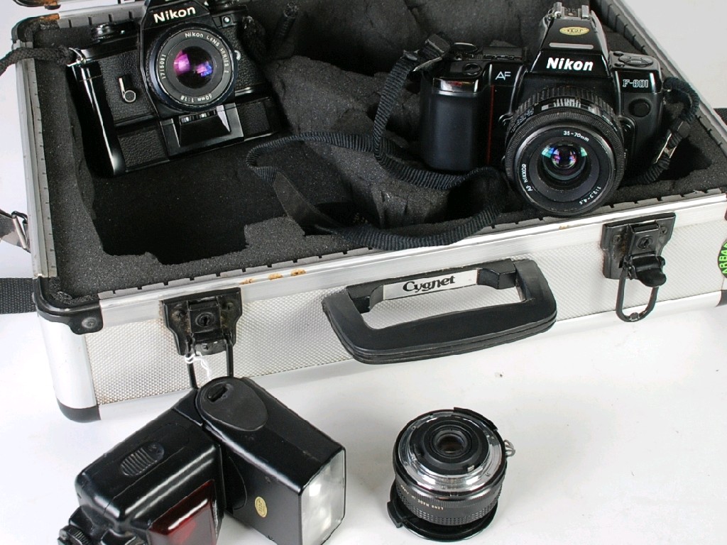 Appraisal: NIKON 'EM' SLR ROLL FILM CAMERA with Nikon Series E