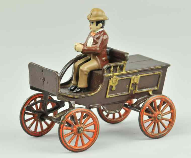 Appraisal: KENTON RUNABOUT Early cast iron example painted in brown body