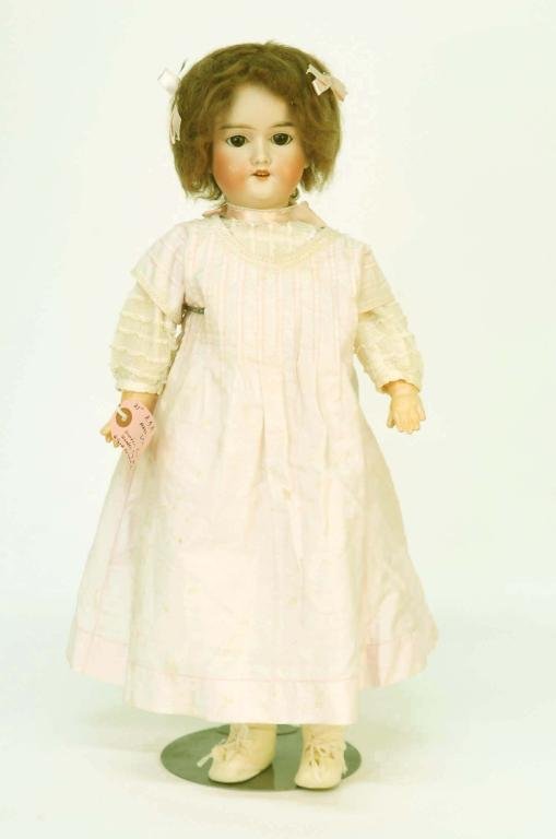 Appraisal: An Armand Marseille Flora Dora bisque socket head child doll