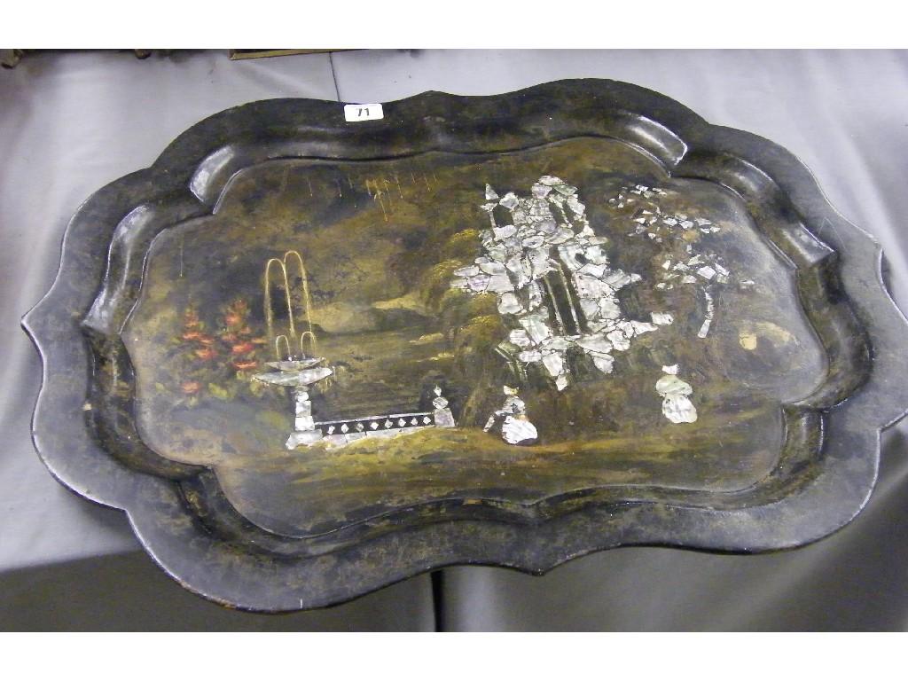 Appraisal: Victorian ebonised papier mache tray with scallop shell border and