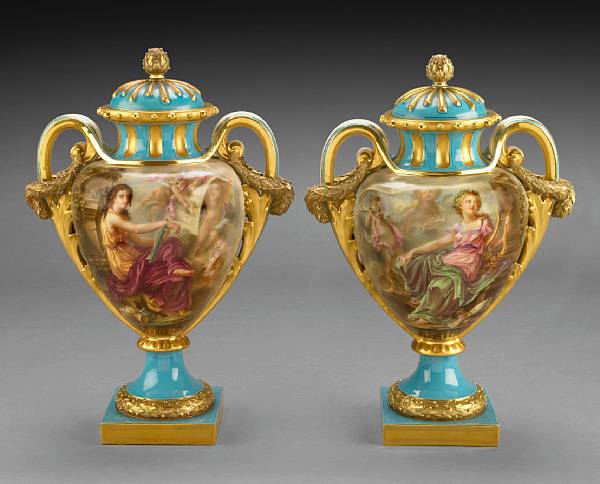 Appraisal: A pair of Royal Worcester porcelain covered urns date code