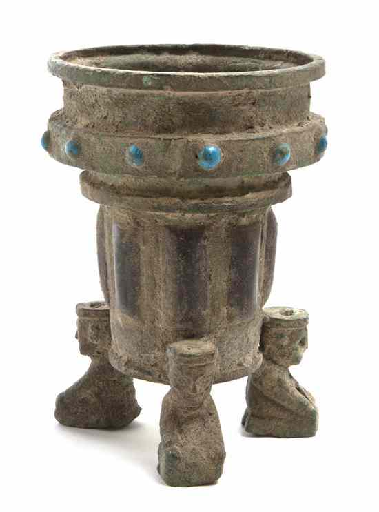 Appraisal: A Chinese Bronze Cylindrical Vessel having raised turquoise bosses the