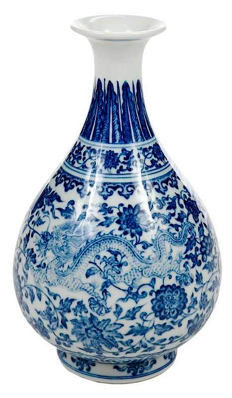 Appraisal: Chinese Blue and White Dragon Vase Chinese blue underglaze bulbous