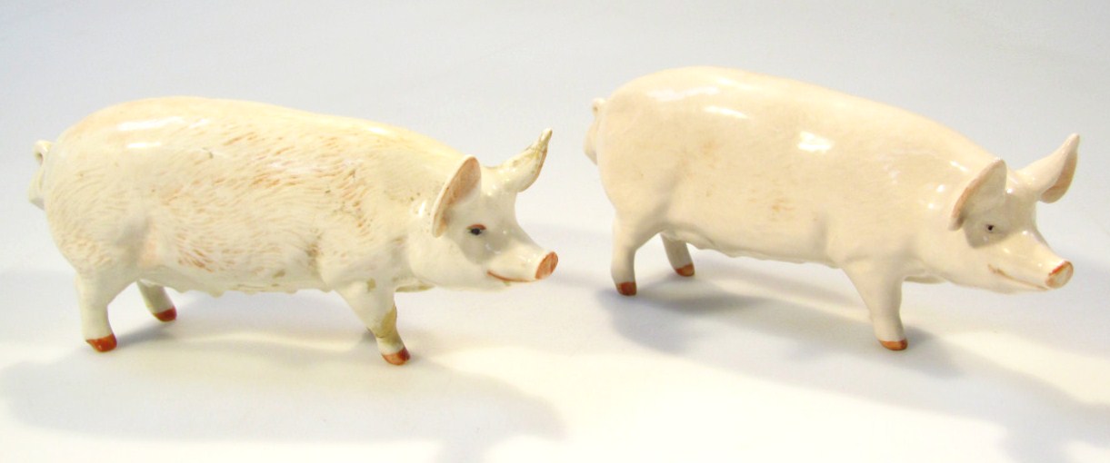 Appraisal: A thC Beswick pottery figure of a pig CH Wall