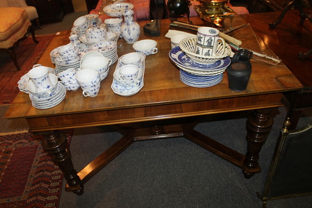 Appraisal: A DUTCH STYLE WALNUT CENTRE TABLE with rectangular crossbanded top