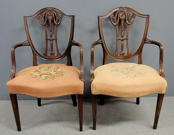 Appraisal: - Pair of Adams style carved mahogany open armchairs with